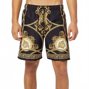 NEW VERSACE swim shorts in black and gold